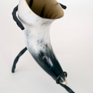 Traditional drinking horn on its stand, illustrative reference photo